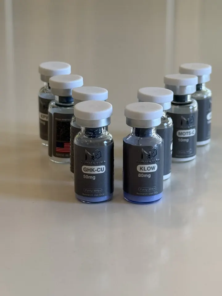 Novanta Research product photo of labeled GHK-Cu and KLOW research vials.